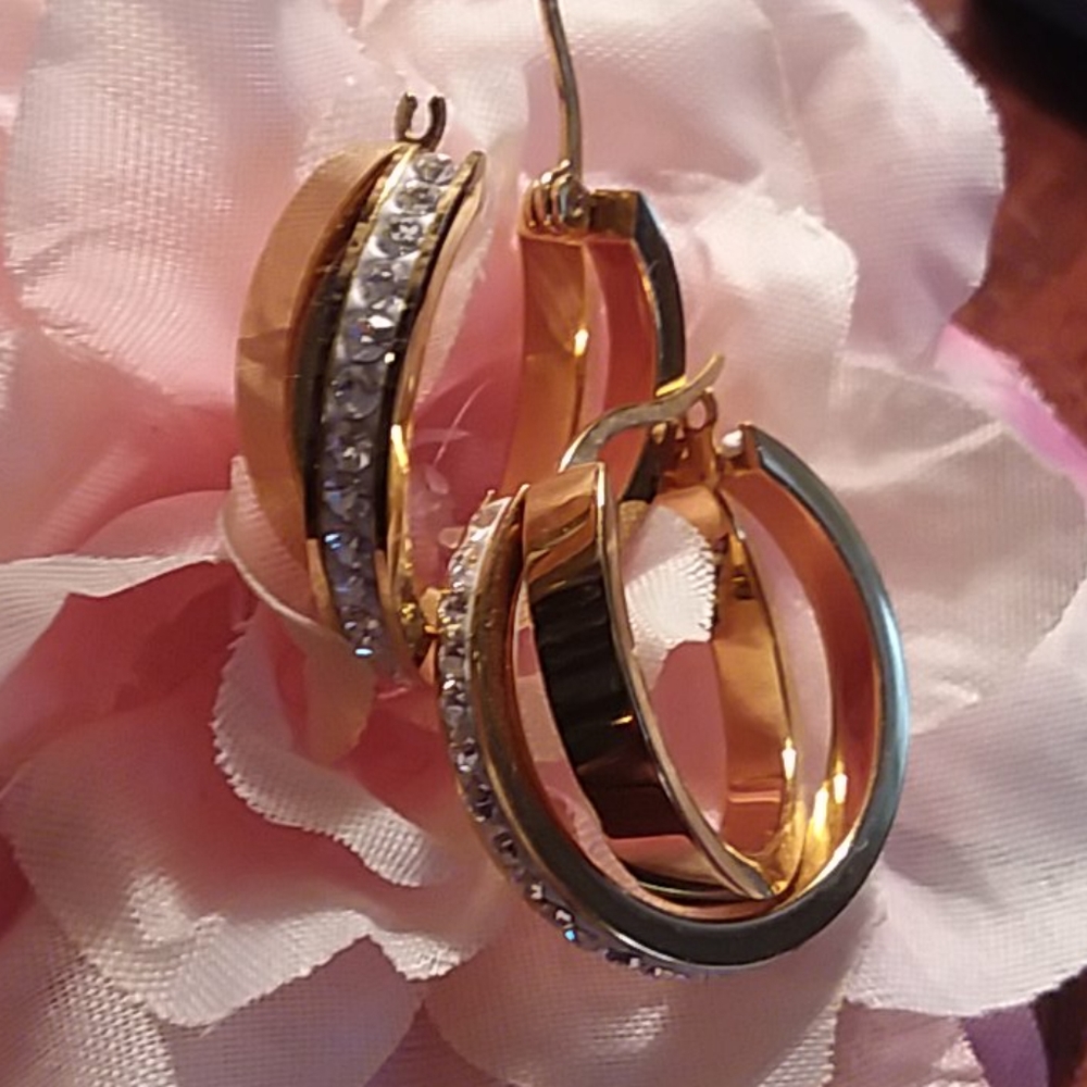 Gold and rhinestone twisted hoops
